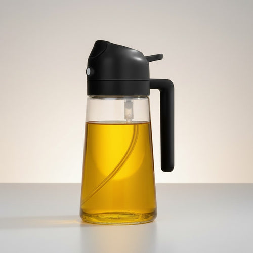 CAMPY 2-in-1 oil sprayer and pourer bottle, 500ml, clear glass with black lid and handle.