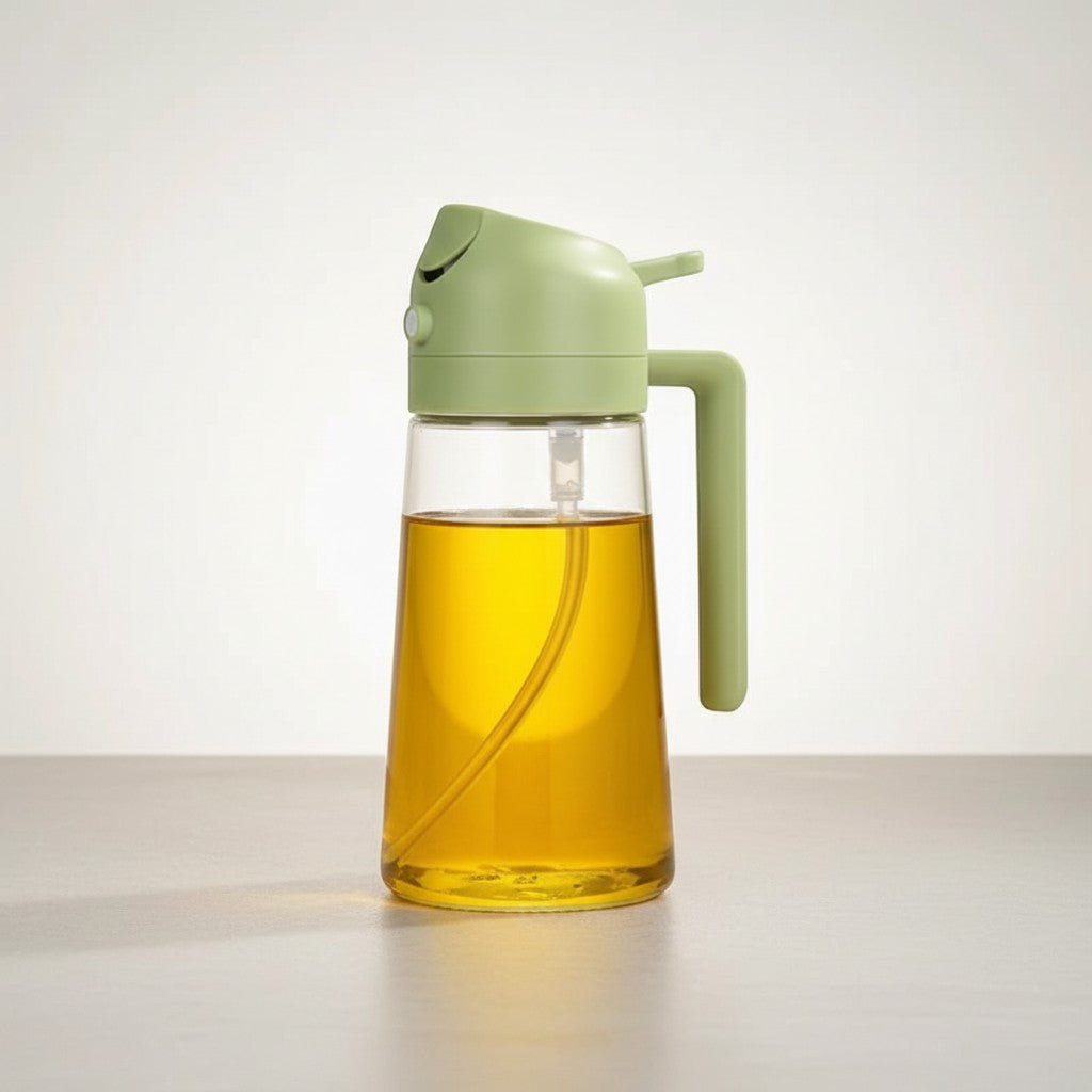 CAMPY 2-in-1 oil sprayer and pourer bottle, 500ml, clear glass with green lid and handle, for outdoor cooking.