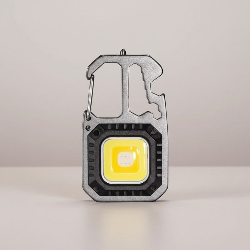 CAMPY Trail-Ready COB Keychain Light with multiple functions including bottle opener, screwdriver, and emergency hammer.