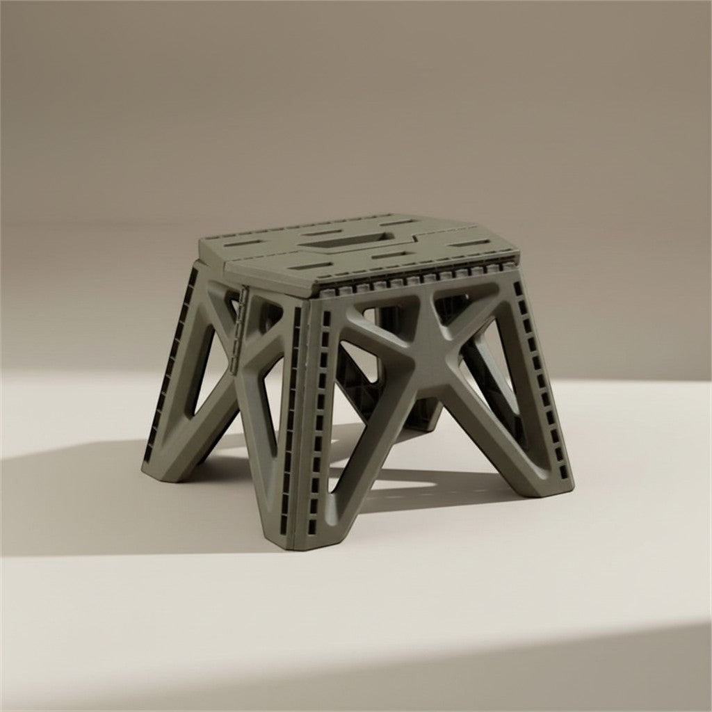CAMPY heavy-duty folding camping stool in gray plastic, perfect for outdoor adventures.