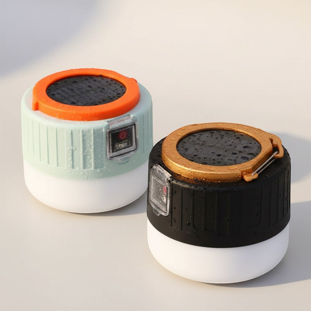 CAMPY rechargeable LED camping lantern with solar panel top, available in black and white with orange trim, and light blue and white with orange trim.